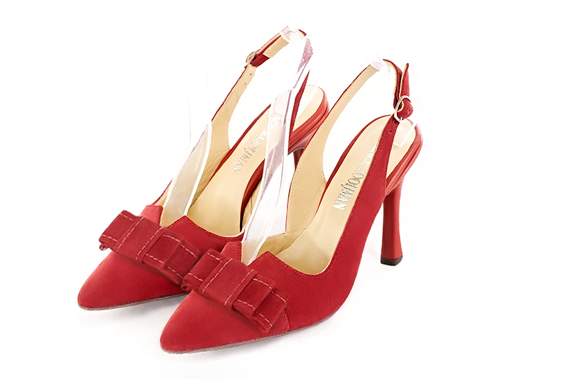 Fuschia pink women's open back shoes, with a knot. Tapered toe. Medium spool heels. Front view - Florence KOOIJMAN